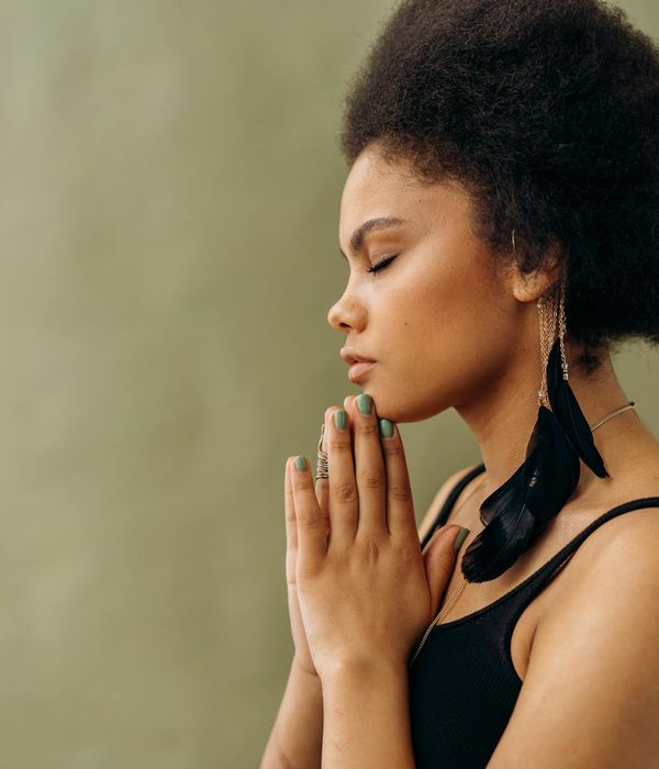 Woman in a calm yoga pose, embodying balance and inner peace.